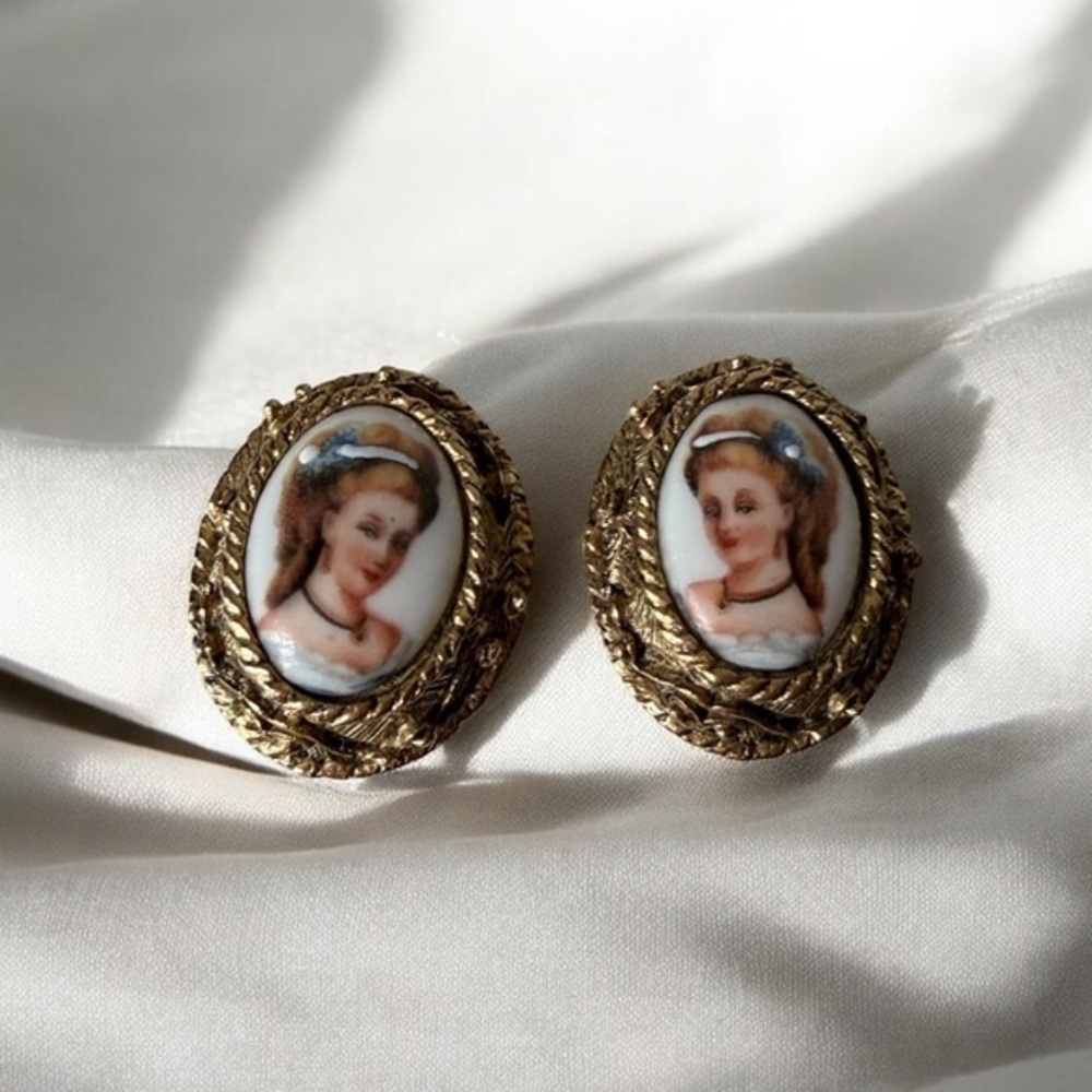 This is a pair of vintage Limoges France hand-painted porcelain earrings